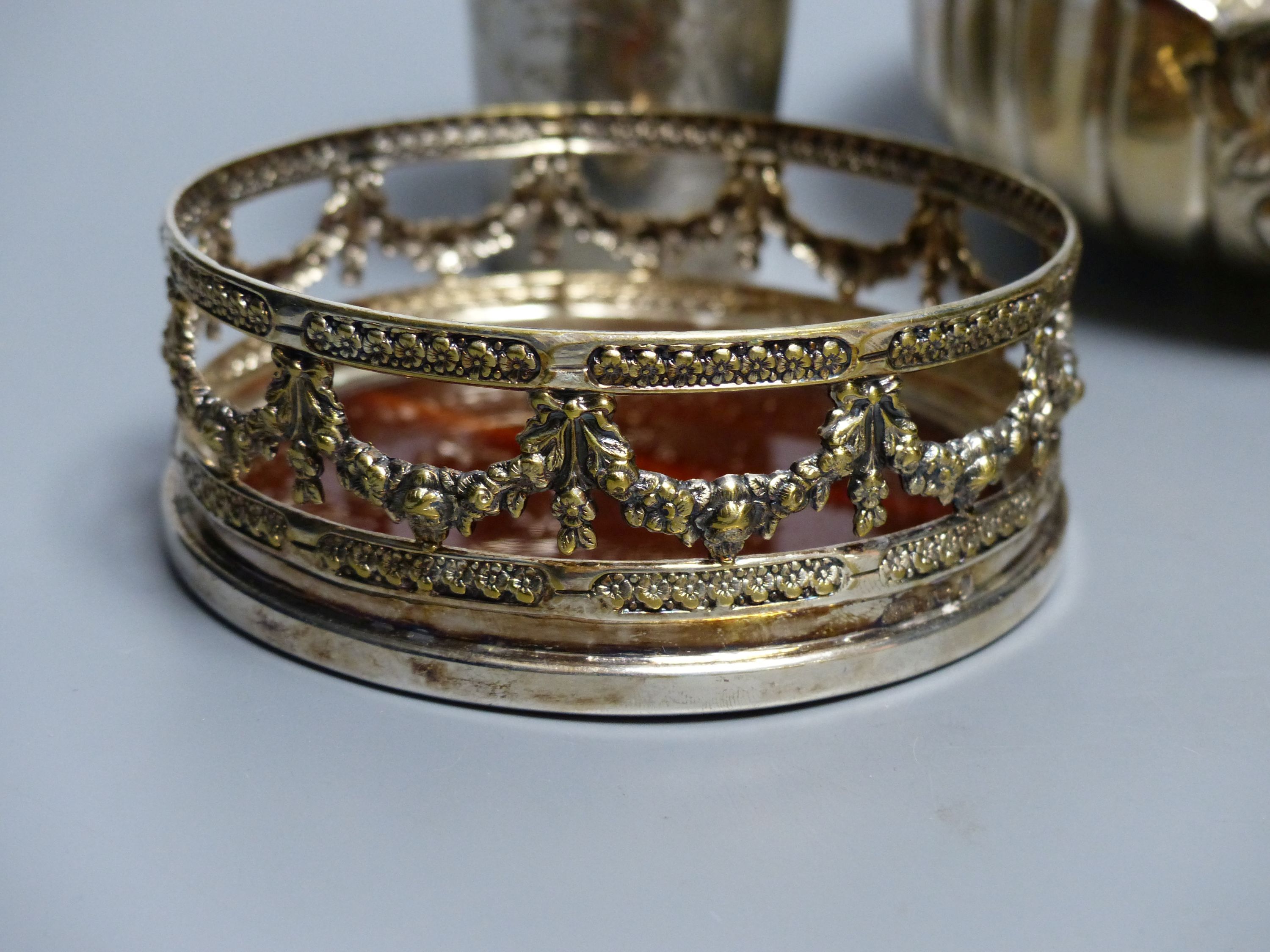 A sterling bowl, 15.1cm, a white metal and enamel spice tower, German beaker, pair of plated coasters and a stand